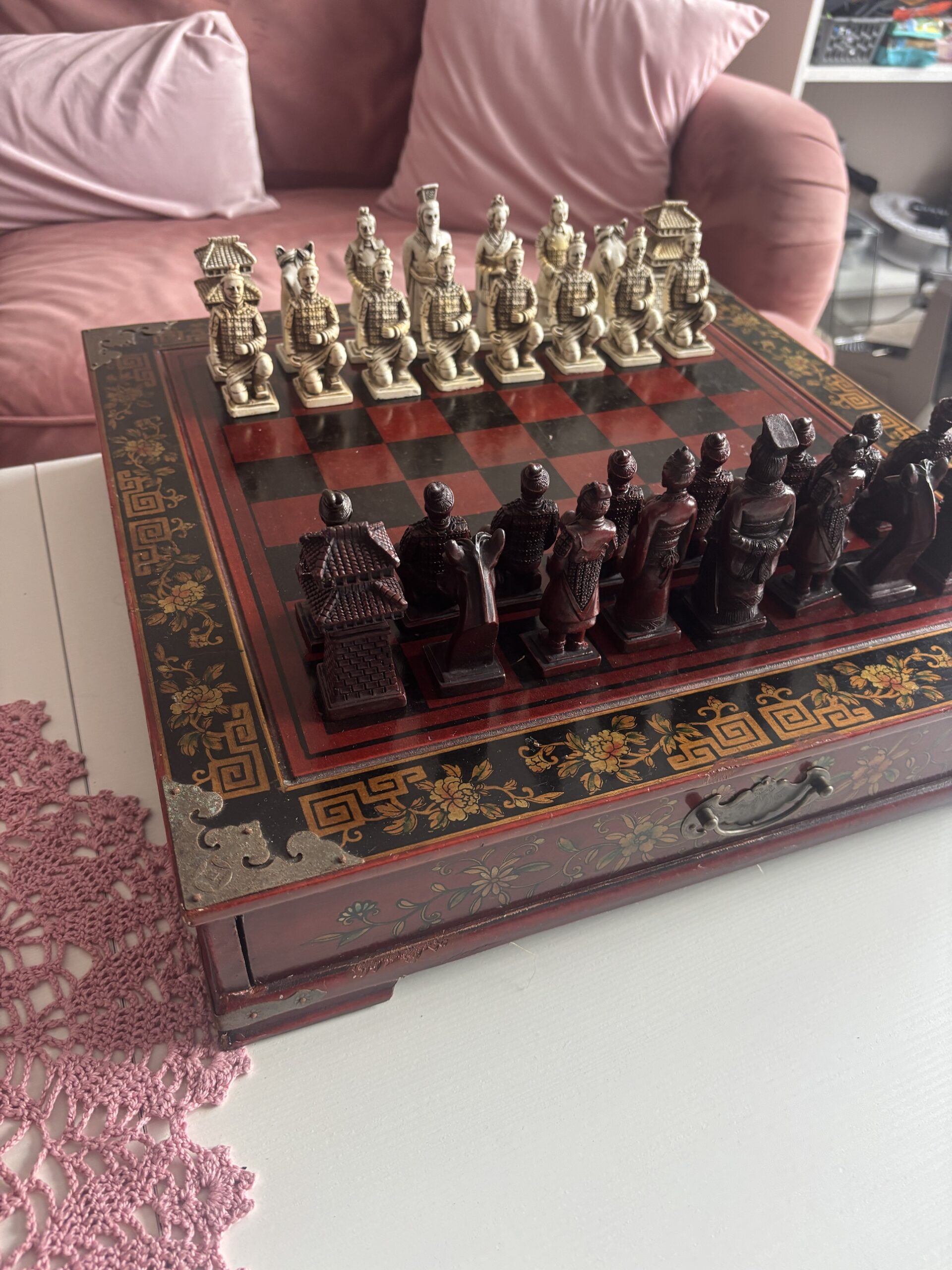 Restored vintage Terracotta Army chess set set up on its lacquered board